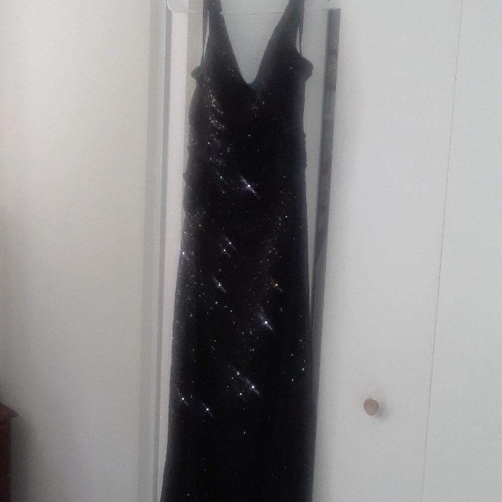 A formal  black  gown . Beautiful sparkly sequence